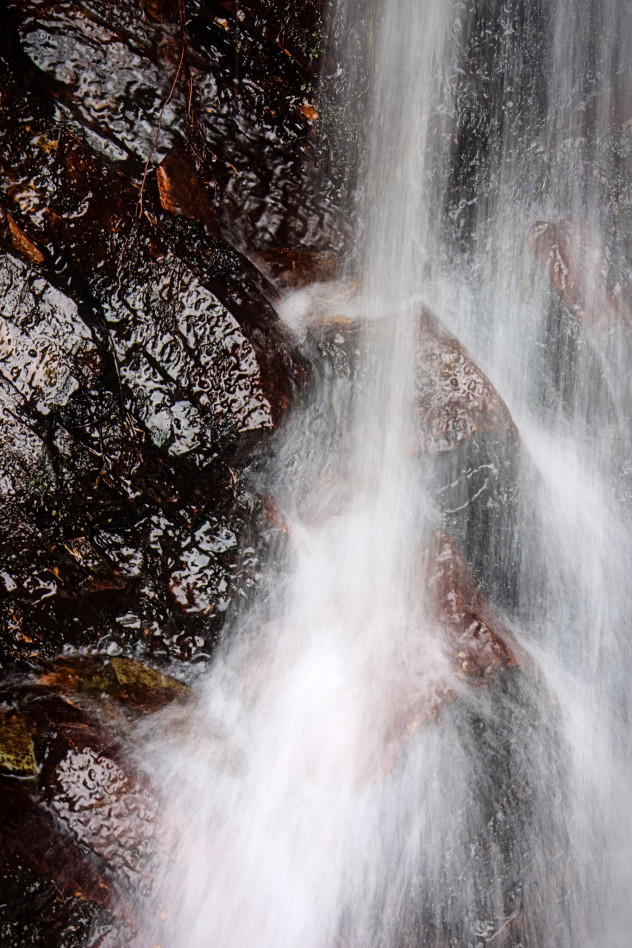 Alternatively, "chunks in gravy", since that's rather what the rocky background looks like to me. 
Detail of a small waterfall on the sides of Birnam Hill.