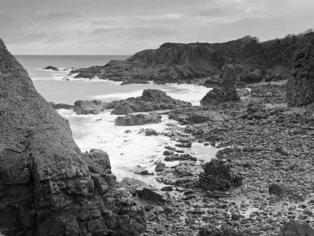 Rocky coastline and small sea-stacks at Muchalls, Aberdeenshire