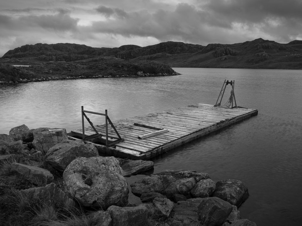 Some kind of wooden pier/jetty thing (possibly for fishing?) on the edge of Loch Tullie