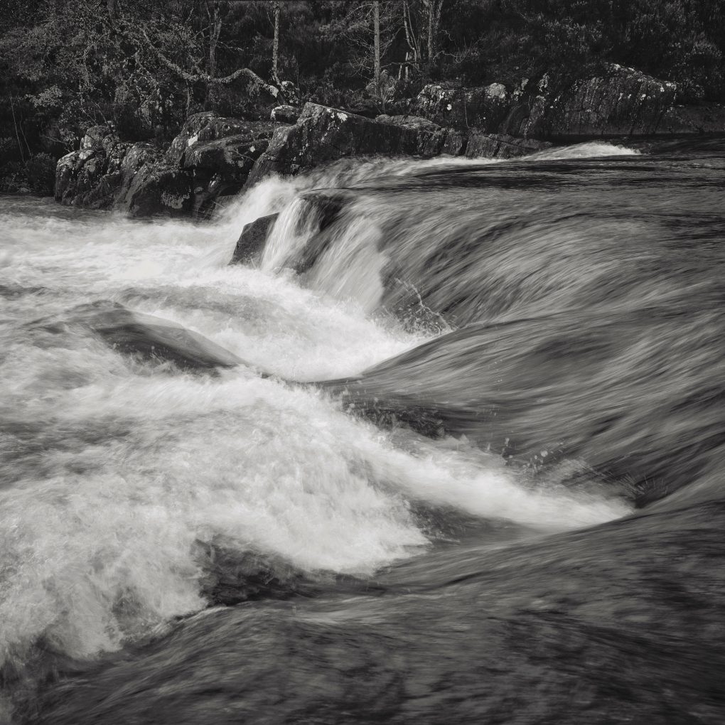 Fast-flowing cascades in the River Affric.